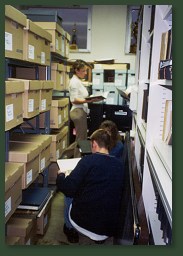 Archive aisle with volunteers